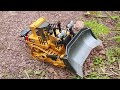 Excavator Digging Rock on the Mountain