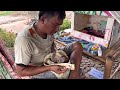 BiBi enjoys taking a bath - picking custard apple with his father