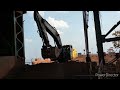 Hopper cleaned by long volvo excavator ll hopper fast cleaning for uninterrupted iron ore production