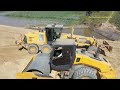 KOMATSU GD655 Motor Grader Spreading Solis Building Road