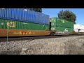 CN 3187, GECX 2038 heading a Westbound intermodal shipping container freight train at Vicksburg, MI