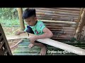 An Orphan boy growing vegetables in the forest, repair the floor of a small bamboo house.