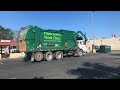 Garbage truck frontloader taking a break