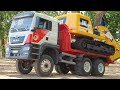 Bruder MAN TGS RC Conversion transporting Excavator SANY SY485H and CAT 320GC