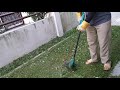 Trimming grass with bosch trimmer