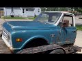 Power washing all the years of grime off of our farm fresh C10.