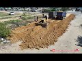 Full Video Perfectly Komatsu D31P dozer leveling ground with 5ton dump truck dumping soil build road