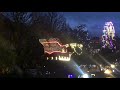 Santa flying in his sleigh over the Christmas market of Montreux