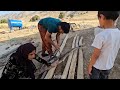 Asghar's family project for hot days: construction of a wooden canopy