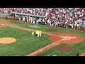 Matt Damon and Casey Affleck throwing ceremonial first pitch at Red Sox and Yankees game at Fenway.