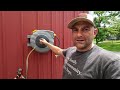 Game CHANGER! Auto-retracting hose reel for homestead watering by Glahoden!