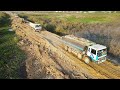 Wonderful Many Big Dump Truck Traffic Jam Wait Unloading Because Bulldozer Gone Fail Of Road