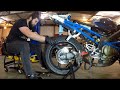 Honda F4i rear rim removal and install + how to change sprocket and rear rotor