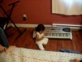 the cutest baby rocking out on the piano