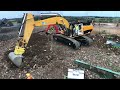 RC hydraulic excavator with ripper and moving driver