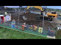 RC  excavator with moving driver and rotary sieve