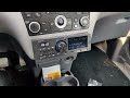 Nissan Almera Tino after market radio built in.