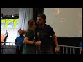 Sarah returns the bow to Stephen Amell at the Arrow panel - SDCC 2019