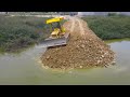 Best Excellent Machines Dozer & Dump Truck In Operator Connecting Road Crossing Water