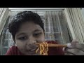 eating spice noodles