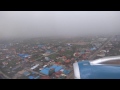 a bit rough, flying through a tropical monsoon storm over Phnom Penh