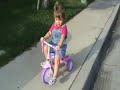 Madison on her tricycle