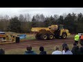 Dump truck pulling sledge at tractor pull