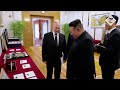 Putin and Kim laugh and chat in front seat footage from limo drive in Pyongyang