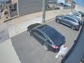 Casing a car in Alley - Ready to break windshield