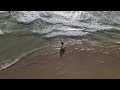 DJI Mavic Air 2 Aerial Footage of a Surfer Entering the Sea