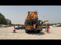 LIEBHERR LTM 90 TON CRANE & KOBELCO P&H 90 TON TRUCK CRANE  LIFTING ANOTHER CRANE TO LOAD ON TRAILER