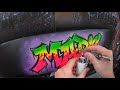 Airbrush graffiti on a skateboard