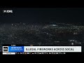 Illegal fireworks light up the night sky over Los Angeles County