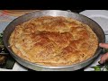 | Traditional Albanian burek with tomatoes and onions filling