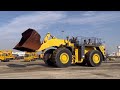 Heavy equipment yard a lot of massive equipment you never see before. Caterpillar Komatsu JCB