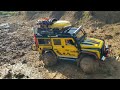 Down this sticky mud and can not go back. Rc Car Off Road Traxxas Trx4 Defender stuck in sticky mud.