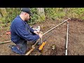 Excavator Pulls Deep Well Pump