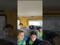 School children singing and making fun in School Bus as practicing for Annual day