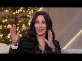 Cher Tells Stories Behind Greatest Hits Of The Decades: 'Believe,' 'If I Could Turn Back Time,' More