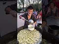 Loving Chinese Guy Cook Free dumplings Food for the elders  in a Downtown Village