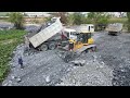 Incredible Bulldozer SHANTUI Pushing Big Stone into Lutos lake with many Dumps truck 25T Unloading