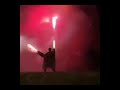 Man with roman candles on hands with Hopes And Dreams playing