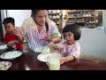 Pregnant mom and mother prepare healthy food for family dinner - Family food cooking