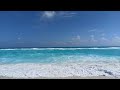 Waves Crashing at Playa Delfines in Cancún, Mexico