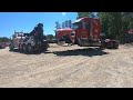 Unloading A Wrecked Tractor