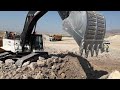 Hidromek Excavator Loading  trucks