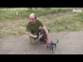 Ukrainian soldiers train dropping grenades with 'drone for dummies'