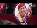 Venezuela president dances on stage as he claims voting for opposition would cause 'civil war'