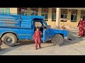 Talking and helping Rasool to the shopkeeper in giving him a car to water the trees