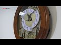 Rhythm Wall Clock With Music and Movements - Magic Motion Clock